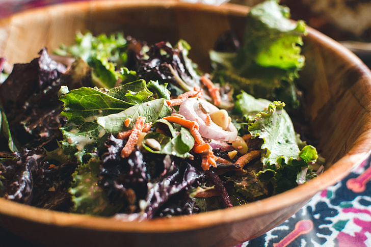 Vegetable salad in a wooden bowl